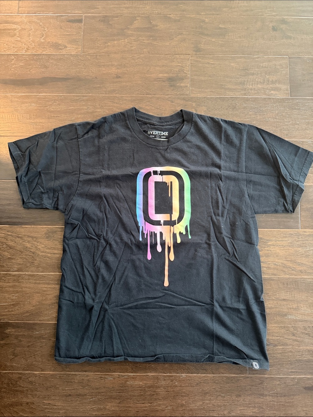 Overtime Black Short-Sleeve Tee with Multicolor Drip Logo